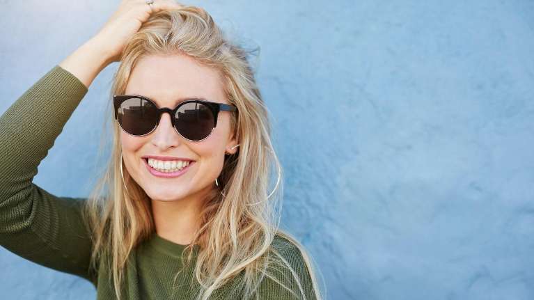 woman with glasses smiling in Reidland, KY